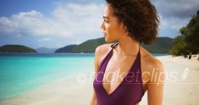 Beautiful black woman standing on tropical Virgin Island