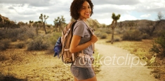 Cute African woman hiking Joshua Tree National Park