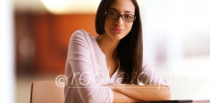 A Latina businesswoman poses for a portrait