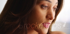 Close up of beautiful Latina female looking off camera with sad expression